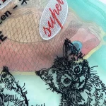 Litière pour chat – sac organza